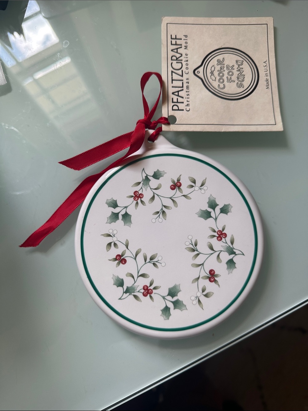Pfaltzgraff White Ceramic Ornament with Green Trim and Red Ribbon